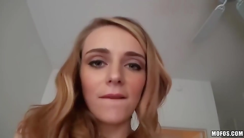 Sexy young blonde in red dress